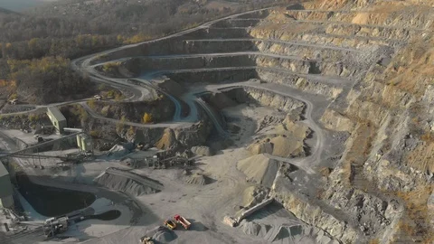 Drone shot of quarry. Open pit mine where stone, rock and sand is excavated Stock Footage 122571781