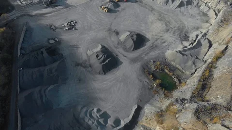 Drone shot of quarry. Open pit mine where stone, rock and sand is excavated Stock Footage 122572128