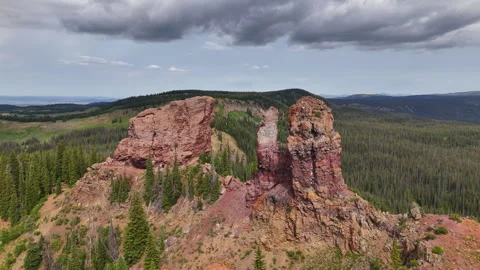 Drone Shot of Rabbit Ears Pass Peak, Rock Formations Above Pine Forest in Stock-Footage 341838620