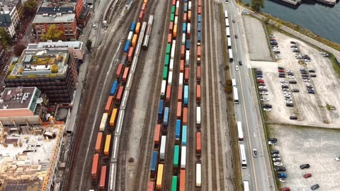 Drone Shot of Rail Containers Beside Downtown Vancouver Traffic Stock-Footage 345983853