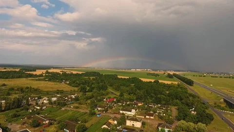 Drone shot of rainbow over the city 스톡 동영상 117849185