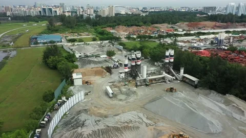 Drone shot of refinery &amp; raw materials at construction site, Singapore Stock Footage 151566973