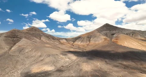 Drone shot of remote desert mountain valley Stock Footage 345424311