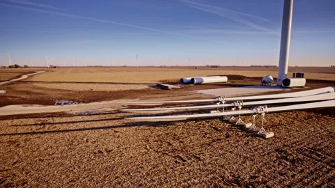 Drone shot of renewable energy infrastructure under construction in rural Stock Footage 328389599