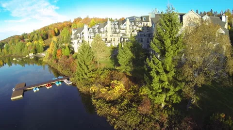 Drone shot of a resort in the mountain during fall Stock Footage 63865908