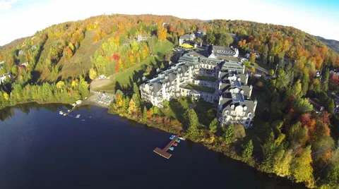 Drone shot of a resort in the mountain during fall Stock Footage 63866101