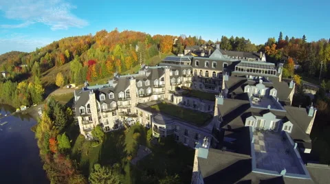 Drone shot of a resort in the mountain during fall Stock Footage 63866237