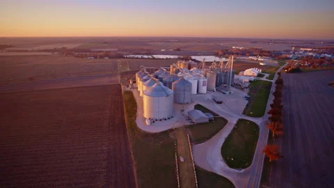 Drone shot revealing extensive grain storage bins at a central elevator Stock Footage 328780163