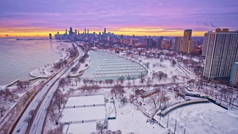 Drone shot revealing the Loop in Chicago under soft winter dawn light. Stock Footage 331682417