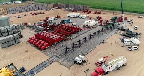 Drone shot reveals the operation of this high tech directional fracking Stock Footage 114242067