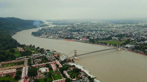 Drone shot of Rishikesh City during monsoon, Aerial View of Holy River Ganga Stock Footage 161114332