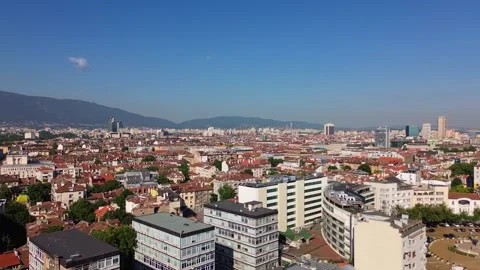 Drone shot, rising above Sofia, the capital city of Bulgaria, on a bright Stock Footage 286822083