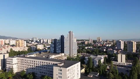 Drone shot, rising above Sofia, the capital city of Bulgaria, on a bright Stock Footage 287333626