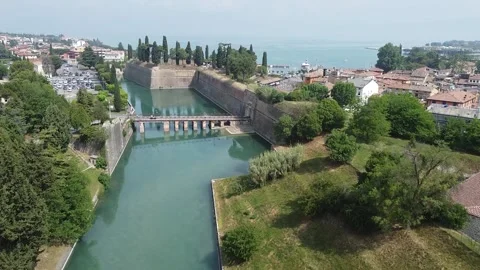 Drone shot of the river and a bridge in Peschiera del Garda Stock Footage 209151275