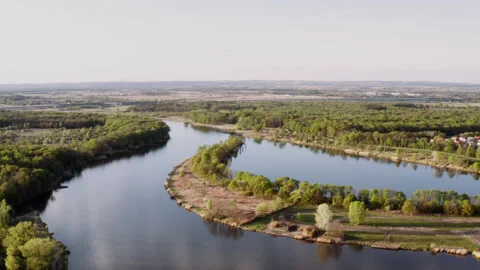 Drone shot of a river flowing through green environment. Stock Footage 149112779