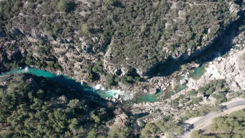 Drone shot of a River flowing through a canyon from above 4k 30 Stock Footage 234071607