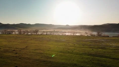 Drone shot of river Ili and spring steppe in Kazakhstan Stock Footage 335067491