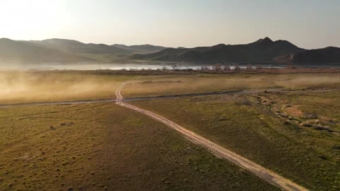 Drone shot of river Ili and spring steppe in Kazakhstan Stock Footage 335067553