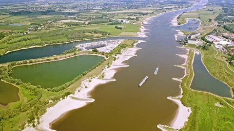 Drone shot of the river Maas with floodplain Stock Footage 231487988