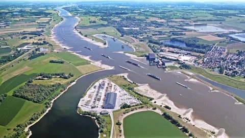 Drone shot of the river Maas with floodplain Stock Footage 231488763