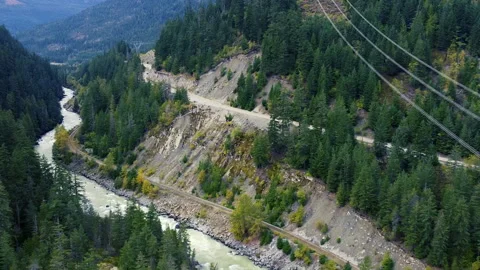 Drone shot of the river, railroad and road in British Columbia Stock Footage 140074829