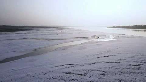 Drone shot  of river surface in winter sunset, ice and snow river Vídeo Stock 234310987