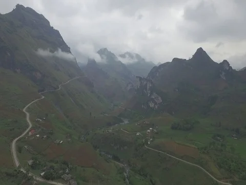 Drone shot: Road cut the to mountain of Ha Giang, Vietnam Stock Footage 81827115
