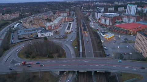 Drone shot of road junction overpass and suburban apartment buildings Stock Footage 91403009