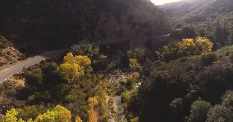 Drone shot of a road in the mountains Stock Footage