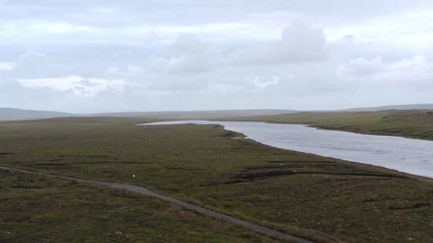 Drone shot of a roadside loch on the Outer Hebrides Stock Footage 327830945