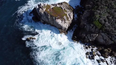 Drone shot - rocks, beach waves dark water Stock Footage 270943397