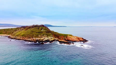 Drone shot of rocky cape extending into the sea, Sozopol, Bulgaria Stock Footage 336340460
