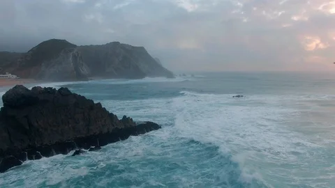 Drone shot of the rocky coast of Portugal washed by Atlantic ocean Stock Footage