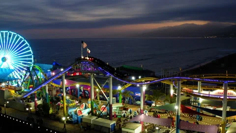 Drone Shot Of Roller Coaster At Santa Monica Pier At Night 4K 24FPS Stock Footage 195554739
