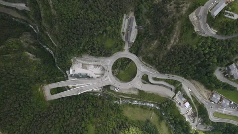 Drone shot of roundabout (circular traffic) in the mountains of Andorra 스톡 동영상 249533389