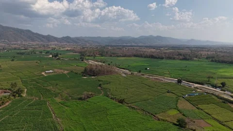 Drone Shot Rural Farm Fields with Mountain Haze Pollution Scene Stock Footage 328686986