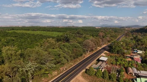 Drone Shot of Rural Landscape Fields Mountains and Dramatic Cloud Sky Stock Footage 328277083