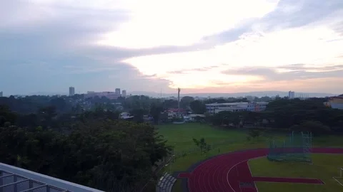 Drone shot of school field with oval track 動画素材 230605045