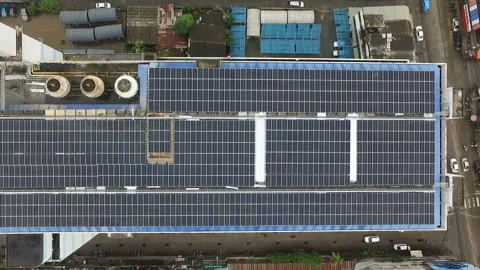 Drone shot sees a solar cell on the roof Stock Footage 139901710
