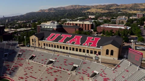 Drone shot showing the Rice-Eccles Stadium and the surrounding landscape Stock Footage 341247118