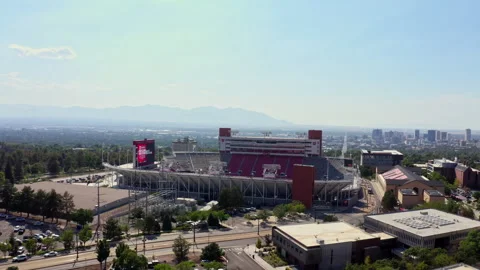 Drone shot showing the Rice-Eccles Stadium and the surrounding landscape Stock Footage 341247449