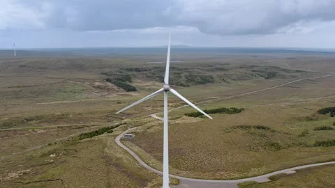 Drone shot of a single wind turbine on the Hebrides Stock Footage 327830963