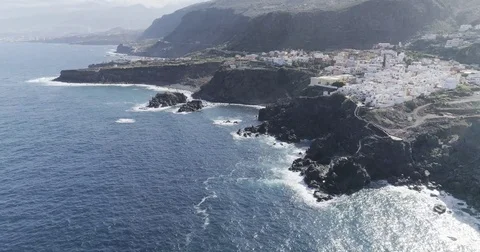 Drone shot of small city located over shoreline in sunny weather. Canary Islands Stock Footage 83869258