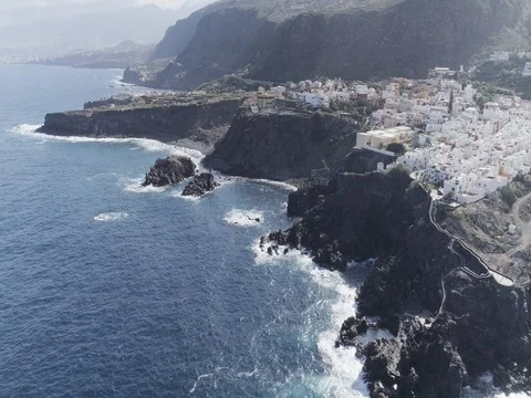 Drone shot of small city located over shoreline in sunny weather. Canary Islands Stock Footage 83869926