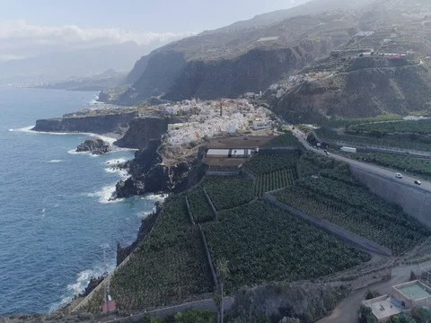 Drone shot of small city located over shoreline in sunny weather. Canary Islands Stock Footage 83870150
