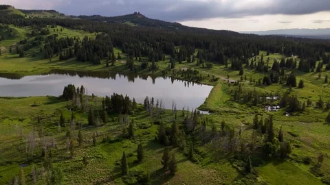 Drone Shot of Small Lake in Landscape of Rocky Mountain, Rabbit Ears Pass Stock Footage 342277076