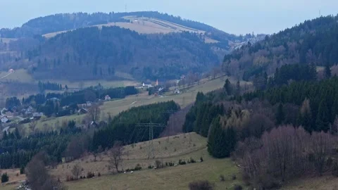 Drone shot of small settlements on mountain slopes in early spring landscap.. Stock Footage 333012377