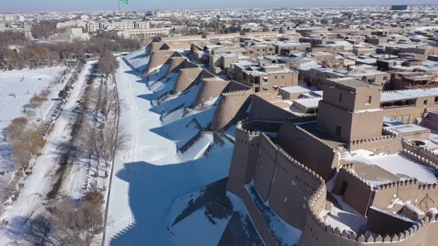 Drone Shot of Snow on Clay Rooftops in Ancient Khiva Stock Footage 345814478