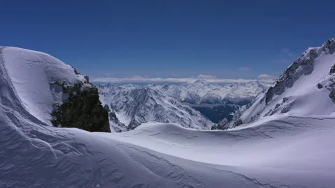 Drone shot of snow mountain range landscape in Georgia Jantugani Pass Mestia. Stock Footage 200499148