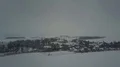Drone shot snow white and gray foggy winter weather at small village landscape 4k or 4k+ Resolution